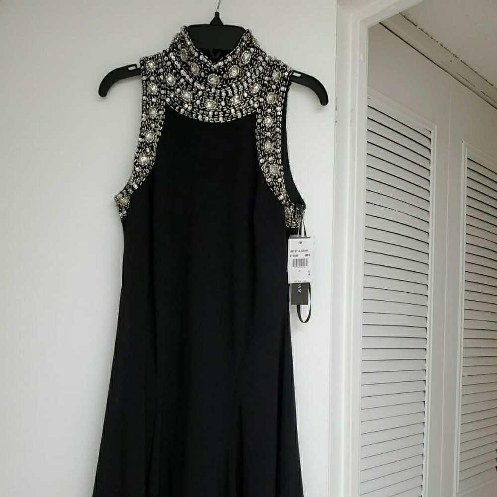 Black elegant woman's dress with crystals
